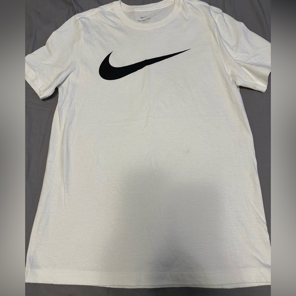 Nike Men's Tee in White with Black Swoosh